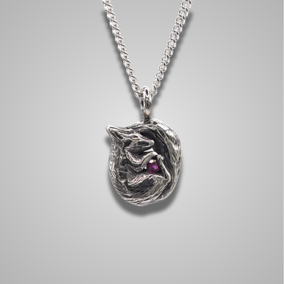 A curled up squirrel snuggling a gemstone. The squirrel is realistic and detailed. The sparkly stone is a ruby. 